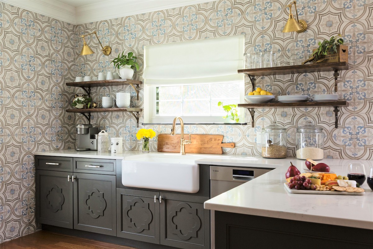 sleek design kitchen with geometric wallpaper, white countertop & dark brown cupboards